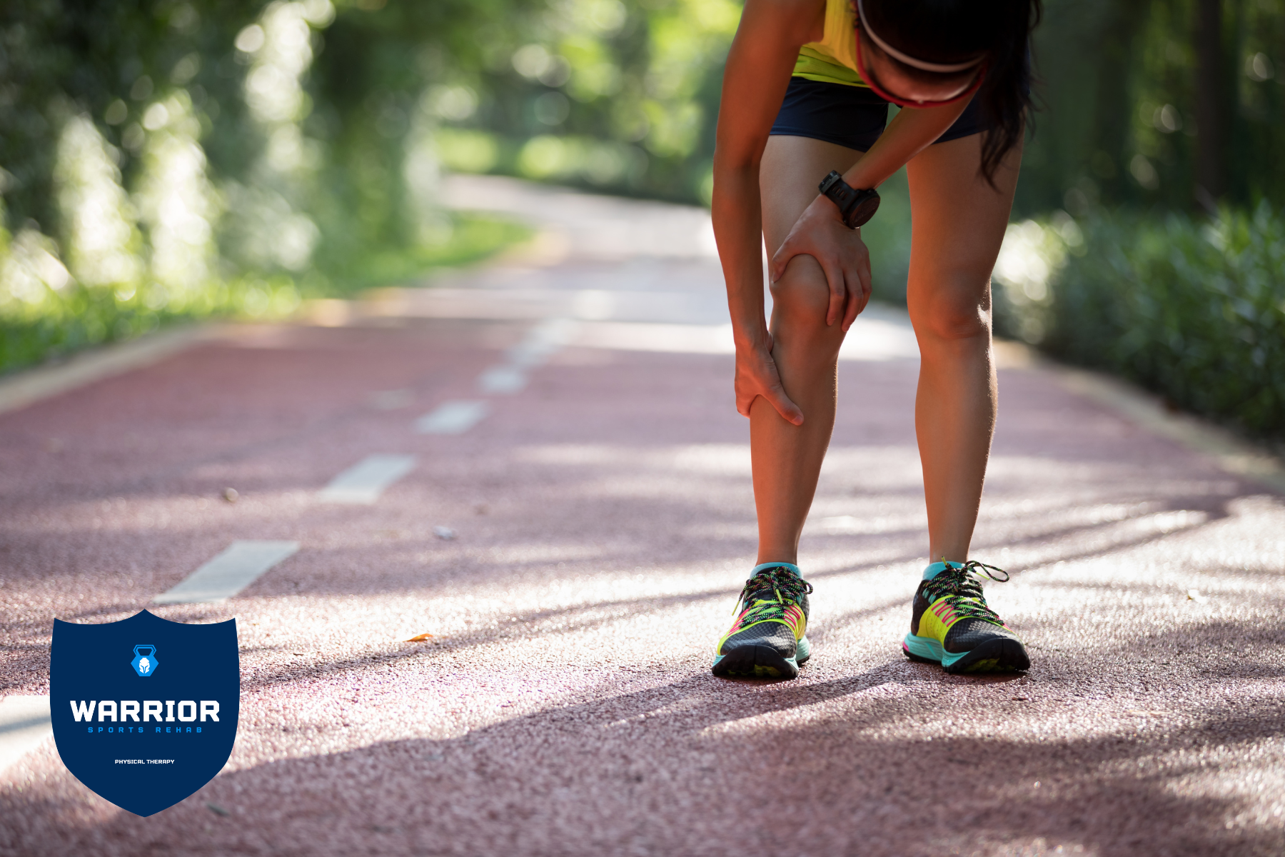 Young woman running with knee pain